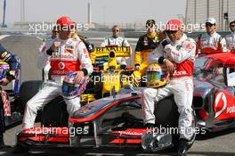12.03.2010 Sakhir, Bahrain,  Jenson Button (GBR), McLaren Mercedes and Lewis Hamilton (GBR), McLaren Mercedes - Formula 1 World Championship, Rd 1, Bahrain Grand Prix, Friday