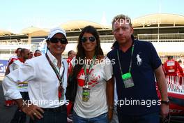 14.03.2010 Sakhir, Bahrain,  Emerson Fittipaldi (BRA) and Boris Becker - Formula 1 World Championship, Rd 1, Bahrain Grand Prix, Sunday Pre-Race Grid