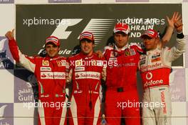 14.03.2010 Sakhir, Bahrain,  2nd place Felipe Massa (BRA), Scuderia Ferrari with 1st place Fernando Alonso (ESP), Scuderia Ferrari, Stefano Domenicali (ITA) Ferrari General Director and 3rd place Lewis Hamilton (GBR), McLaren Mercedes - Formula 1 World Championship, Rd 1, Bahrain Grand Prix, Sunday Podium