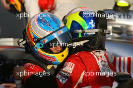 14.03.2010 Sakhir, Bahrain,  Felipe Massa (BRA), Scuderia Ferrari and Fernando Alonso (ESP), Scuderia Ferrari - Formula 1 World Championship, Rd 1, Bahrain Grand Prix, Sunday Podium