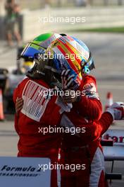 14.03.2010 Sakhir, Bahrain,  Fernando Alonso (ESP), Scuderia Ferrari, Felipe Massa (BRA), Scuderia Ferrari - Formula 1 World Championship, Rd 1, Bahrain Grand Prix, Sunday Podium