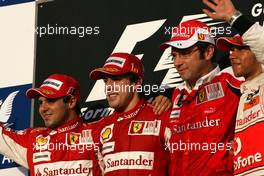 14.03.2010 Sakhir, Bahrain,  Felipe Massa (BRA), Scuderia Ferrari, Fernando Alonso (ESP), Scuderia Ferrari, Stefano Domenicali (ITA), Scuderia Ferrari Sporting Director and Lewis Hamilton (GBR), McLaren Mercedes  - Formula 1 World Championship, Rd 1, Bahrain Grand Prix, Sunday Podium