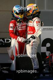 14.03.2010 Sakhir, Bahrain,  Fernando Alonso (ESP), Scuderia Ferrari and Lewis Hamilton (GBR), McLaren Mercedes  - Formula 1 World Championship, Rd 1, Bahrain Grand Prix, Sunday Podium