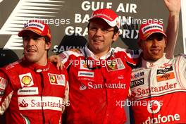 14.03.2010 Sakhir, Bahrain,  Fernando Alonso (ESP), Scuderia Ferrari, Stefano Domenicali (ITA) Ferrari General Director, Lewis Hamilton (GBR), McLaren Mercedes - Formula 1 World Championship, Rd 1, Bahrain Grand Prix, Sunday Podium