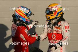 14.03.2010 Sakhir, Bahrain,  1st place Fernando Alonso (ESP), Scuderia Ferrari and Lewis Hamilton (GBR), McLaren Mercedes - Formula 1 World Championship, Rd 1, Bahrain Grand Prix, Sunday Podium
