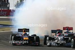 14.03.2010 Sakhir, Bahrain,  Mark Webber (AUS), Red Bull Racing, RB6 and Michael Schumacher (GER), Mercedes GP Petronas - Formula 1 World Championship, Rd 1, Bahrain Grand Prix, Sunday Race