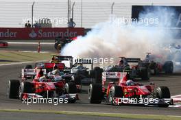 14.03.2010 Sakhir, Bahrain,  Felipe Massa (BRA), Scuderia Ferrari, F10 and Fernando Alonso (ESP), Scuderia Ferrari, F10 - Formula 1 World Championship, Rd 1, Bahrain Grand Prix, Sunday Race