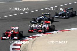 14.03.2010 Sakhir, Bahrain,  Felipe Massa (BRA), Scuderia Ferrari, F10 leads Lewis Hamilton (GBR0, McLaren Mercedes, MP4-25 - Formula 1 World Championship, Rd 1, Bahrain Grand Prix, Sunday Race