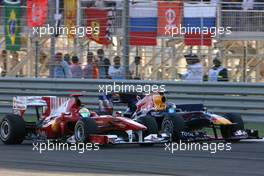 14.03.2010 Sakhir, Bahrain,  Felipe Massa (BRA), Scuderia Ferrari overtakes Sebastian Vettel (GER), Red Bull Racing  - Formula 1 World Championship, Rd 1, Bahrain Grand Prix, Sunday Race