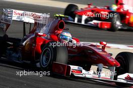 14.03.2010 Sakhir, Bahrain,  Fernando Alonso (ESP), Scuderia Ferrari, F10, Felipe Massa (BRA), Scuderia Ferrari, F10 - Formula 1 World Championship, Rd 1, Bahrain Grand Prix, Sunday Race