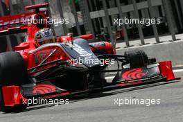 13.03.2010 Sakhir, Bahrain,  Timo Glock (GER), Virgin Racing loses Action wheel  - Formula 1 World Championship, Rd 1, Bahrain Grand Prix, Saturday Practice