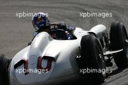 13.03.2010 Sakhir, Bahrain,  60th Anniversary of F1 World Championship, David Coulthard (GBR), Red Bull Racing, Consultant drives the 1954 Mercedes-Benz W196  - Formula 1 World Championship, Rd 1, Bahrain Grand Prix, Saturday