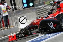 13.03.2010 Sakhir, Bahrain,  Timo Glock (GER), Virgin Racing loses Action wheel - Formula 1 World Championship, Rd 1, Bahrain Grand Prix, Saturday Practice