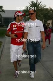 13.03.2010 Sakhir, Bahrain,  Felipe Massa (BRA), Scuderia Ferrari and Michael Schumacher (GER), Mercedes GP Petronas - Formula 1 World Championship, Rd 1, Bahrain Grand Prix, Saturday