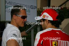 13.03.2010 Sakhir, Bahrain,  Michael Schumacher (GER), Mercedes GP Petronas and Felipe Massa (BRA), Scuderia Ferrari - Formula 1 World Championship, Rd 1, Bahrain Grand Prix, Saturday
