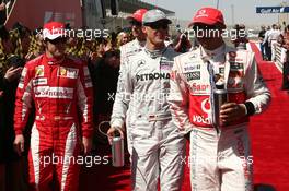 14.03.2010 Sakhir, Bahrain,  Fernando Alonso (ESP), Scuderia Ferrari with Michael Schumacher (GER), Mercedes GP Petronas and Lewis Hamilton (GBR), McLaren Mercedes - Formula 1 World Championship, Rd 1, Bahrain Grand Prix, Sunday