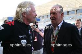 14.03.2010 Sakhir, Bahrain,  Sir Richard Branson, Chairman of the Virgin Group with the Kind Carlos of Spain - Formula 1 World Championship, Rd 1, Bahrain Grand Prix, Sunday