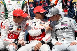 14.03.2010 Sakhir, Bahrain,  Jenson Button (GBR), McLaren Mercedes, Lewis Hamilton (GBR), McLaren Mercedes, Michael Schumacher (GER), Mercedes GP Petronas - Formula 1 World Championship, Rd 1, Bahrain Grand Prix, Sunday