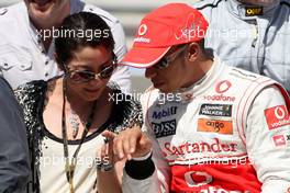 14.03.2010 Sakhir, Bahrain,  Michelle Yeoh (MLY), ex. James Bond girl, actor, Girlfriend of Jean Todt, Lewis Hamilton (GBR), McLaren Mercedes - Formula 1 World Championship, Rd 1, Bahrain Grand Prix, Sunday