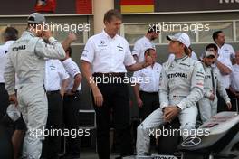 14.03.2010 Sakhir, Bahrain,  Mercedes GP Petronas team photo Michael Schumacher (GER), Mercedes GP Petronas, Nico Rosberg (GER), Mercedes GP Petronas - Formula 1 World Championship, Rd 1, Bahrain Grand Prix, Sunday