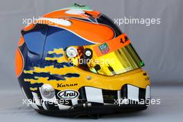 11.03.2010 Sakhir, Bahrain,  Helmet of Karun Chandhok (IND), HRT F1 Team  - Formula 1 World Championship, Rd 1, Bahrain Grand Prix, Thursday