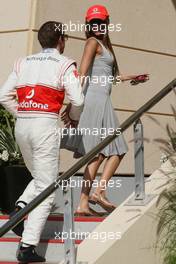 11.03.2010 Sakhir, Bahrain,  Jenson Button (GBR), McLaren Mercedes with his girlfriend Jessica Michibata (JPN) - Formula 1 World Championship, Rd 1, Bahrain Grand Prix, Thursday