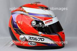 11.03.2010 Sakhir, Bahrain,  Helmet of Kamui Kobayashi (JAP), BMW Sauber F1 Team  - Formula 1 World Championship, Rd 1, Bahrain Grand Prix, Thursday