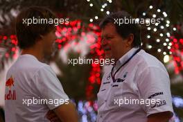 11.03.2010 Sakhir, Bahrain,  Sebastian Vettel (GER), Red Bull Racing talks with Norbert Haug (GER), Mercedes, Motorsport chief - Formula 1 World Championship, Rd 1, Bahrain Grand Prix, Thursday