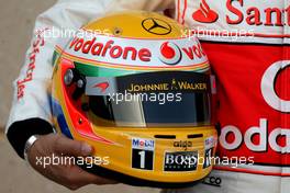 11.03.2010 Sakhir, Bahrain,  The helmet of Lewis Hamilton (GBR), McLaren Mercedes - Formula 1 World Championship, Rd 1, Bahrain Grand Prix, Thursday