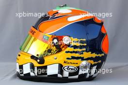 11.03.2010 Sakhir, Bahrain,  Helmet of Karun Chandhok (IND), HRT F1 Team   - Formula 1 World Championship, Rd 1, Bahrain Grand Prix, Thursday