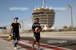 10.03.2010 Sakhir, Bahrain,  Bruno Senna (BRA), Hispania Racing F1 Team, Karun Chandhok (IND), Hispania Racing F1 Team - Formula 1 World Championship, Rd 1, Bahrain Grand Prix, Wednesday