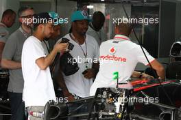 05.11.2010 Sao Paulo, Brazil,  Lewis Hamilton (GBR), McLaren Mercedes and Pharrell Williams, Musician - Formula 1 World Championship, Rd 18, Brazilian Grand Prix, Friday