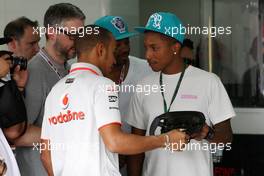 05.11.2010 Sao Paulo, Brazil,  Lewis Hamilton (GBR), McLaren Mercedes and Pharrell Williams, Musician - Formula 1 World Championship, Rd 18, Brazilian Grand Prix, Friday