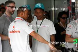 05.11.2010 Sao Paulo, Brazil,  Lewis Hamilton (GBR), McLaren Mercedes and Pharrell Williams, Musician - Formula 1 World Championship, Rd 18, Brazilian Grand Prix, Friday