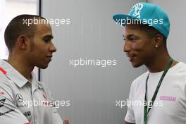 05.11.2010 Sao Paulo, Brazil,  Lewis Hamilton (GBR), McLaren Mercedes and Pharrell Williams, Musician - Formula 1 World Championship, Rd 18, Brazilian Grand Prix, Friday