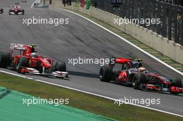 07.11.2010 Sao Paulo, Brazil,  Fernando Alonso (ESP), Scuderia Ferrari and Lewis Hamilton (GBR), McLaren Mercedes - Formula 1 World Championship, Rd 18, Brazilian Grand Prix, Sunday Race