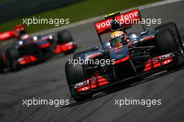 07.11.2010 Sao Paulo, Brazil,  Lewis Hamilton (GBR), McLaren Mercedes leads Jenson Button (GBR), McLaren Mercedes - Formula 1 World Championship, Rd 18, Brazilian Grand Prix, Sunday Race