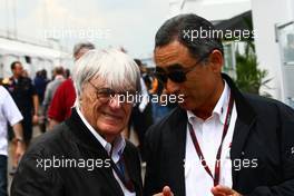 11.06.2010 Montreal, Canada,  Bernie Ecclestone (GBR) and  Hirohide Hamashima (JPN), Head of Bridgestone Tyre Development - Formula 1 World Championship, Rd 8, Canadian Grand Prix, Friday Practice