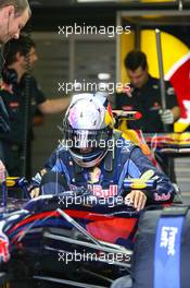 11.06.2010 Montreal, Canada,  Sebastian Vettel (GER), Red Bull Racing getting in the car - Formula 1 World Championship, Rd 8, Canadian Grand Prix, Friday