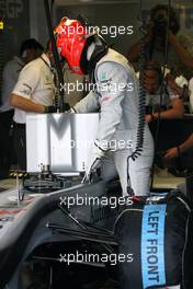 11.06.2010 Montreal, Canada,  Michael Schumacher (GER), Mercedes GP getting in the car  - Formula 1 World Championship, Rd 8, Canadian Grand Prix, Friday Practice