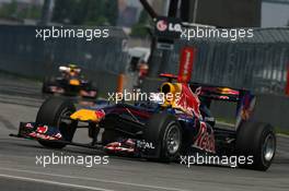 13.06.2010 Montreal, Canada,  Sebastian Vettel (GER), Red Bull Racing, RB6 leads Mark Webber (AUS), Red Bull Racing - Formula 1 World Championship, Rd 8, Canadian Grand Prix, Sunday Race