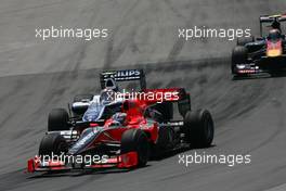 13.06.2010 Montreal, Canada,  Timo Glock (GER), Virgin Racing and Nico Hulkenberg (GER), Williams F1 Team  - Formula 1 World Championship, Rd 8, Canadian Grand Prix, Sunday Race