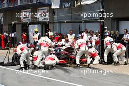 13.06.2010 Montreal, Canada,  Jenson Button (GBR), McLaren Mercedes pit stop - Formula 1 World Championship, Rd 8, Canadian Grand Prix, Sunday Race