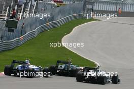 13.06.2010 Montreal, Canada,  Heikki Kovalainen (FIN), Lotus F1 Team and Nico Rosberg (GER), Mercedes GP  - Formula 1 World Championship, Rd 8, Canadian Grand Prix, Sunday Race