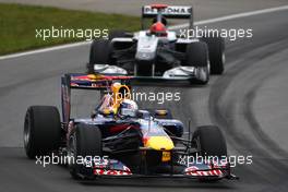 12.06.2010 Montreal, Canada,  Sebastian Vettel (GER), Red Bull Racing and Michael Schumacher (GER), Mercedes GP  - Formula 1 World Championship, Rd 8, Canadian Grand Prix, Saturday Qualifying