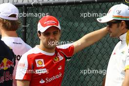 13.06.2010 Montreal, Canada,  Felipe Massa (BRA), Scuderia Ferrari with Vitantonio Liuzzi (ITA), Force India F1 Team - Formula 1 World Championship, Rd 8, Canadian Grand Prix, Sunday