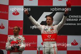 18.04.2010 Shanghai, China,  1st place Jenson Button (GBR), McLaren Mercedes with 2nd place Lewis Hamilton (GBR), McLaren Mercedes - Formula 1 World Championship, Rd 4, Chinese Grand Prix, Sunday Podium