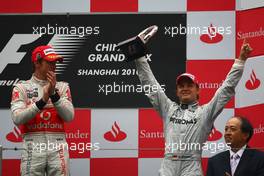18.04.2010 Shanghai, China,  1st place Jenson Button (GBR), McLaren Mercedes with 3rd place Nico Rosberg (GER), Mercedes GP Petronas - Formula 1 World Championship, Rd 4, Chinese Grand Prix, Sunday Podium