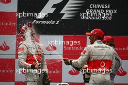 18.04.2010 Shanghai, China,  1st place Jenson Button (GBR), McLaren Mercedes with 2nd place Lewis Hamilton (GBR), McLaren Mercedes - Formula 1 World Championship, Rd 4, Chinese Grand Prix, Sunday Podium