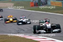 18.04.2010 Shanghai, China,  Michael Schumacher (GER), Mercedes GP Petronas, W01 leads Rubens Barrichello (BrA), Williams F1 Team, FW32 - Formula 1 World Championship, Rd 4, Chinese Grand Prix, Sunday Race